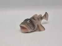 porcelænsfigur af en ulk, fremstillet af Bing & Grøndahl, nummer 2144.