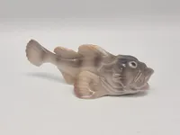 porcelænsfigur af en ulk, fremstillet af Bing & Grøndahl, nummer 2144.