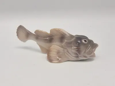porcelænsfigur af en ulk, fremstillet af Bing & Grøndahl, nummer 2144.