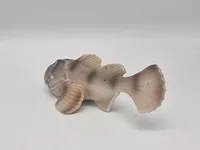 porcelænsfigur af en ulk, fremstillet af Bing & Grøndahl, nummer 2144.