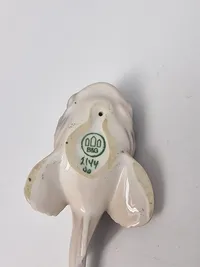 porcelænsfigur af en ulk, fremstillet af Bing & Grøndahl, nummer 2144.