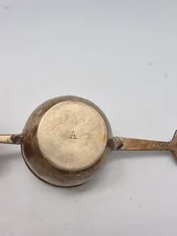 Resturent målebæger
