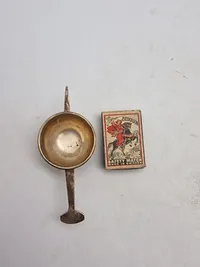 Resturent målebæger