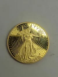 1 stk forgyldt medalje samt 2 stk forgyldte messing barre ( ægte forgyldning?)