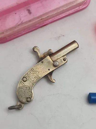 Verdens mindste pistol Vintage Berloque miniature 2mm pinfire pistol