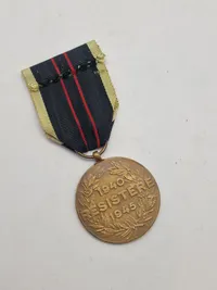 Original belgisk Modstandsmedalje 1940-1945 (Médaille de la Résistance 1940–1945 / Medaille van de Weerstand 1940–1945).