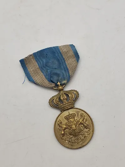 Original  rumænsk Faithful Service Medal" (Medaljen for Trofast Tjeneste), type I, II klasse.