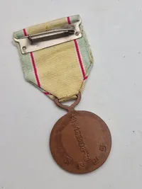 Original Koreas Krigstjenestemedalje (Republic of Korea War Service Medal), også kendt som ROKWSM.