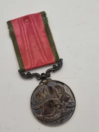 Original Tyrkisk Krimmedalje, en kampagnemedalje udstedt af Sultan Abdulmejid I af Det Osmanniske Rige til allieret militærpersonel, der deltog i Krimkrigen (1854-1856).