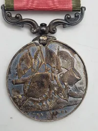 Original Tyrkisk Krimmedalje, en kampagnemedalje udstedt af Sultan Abdulmejid I af Det Osmanniske Rige til allieret militærpersonel, der deltog i Krimkrigen (1854-1856).