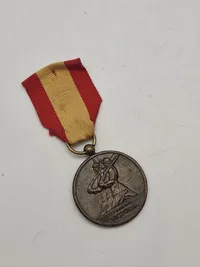 Original spansk mindemedalje fra borgerkrigen, kendt som "Medalla del Alzamiento y Victoria en Bronce - 18 Julio 1936 - 1 Abril 1939".