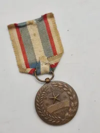 Original Army Good Conduct Medal fra USA, som gives til soldater i den amerikanske hær for eksemplarisk opførsel, effektivitet og loyalitet.