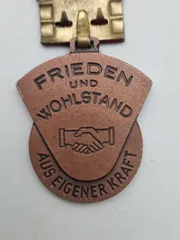 Original sovjetisk medalje kendt som "Medaljen for Aktivist i Socialistisk Konkurrence" fra 1951