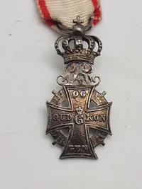 Original Kong Christian X miniature Dannebrogordenen, en dansk ridderorden indstiftet af Christian V i 1671