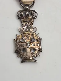 Original Kong Christian X miniature Dannebrogordenen, en dansk ridderorden indstiftet af Christian V i 1671