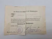 Originalt urkunde for "Ehrenkreuz für Frontkämpfer", som er blevet tildelt en person ved navn Max Korherr, der arbejdede som møbelpolerer i Berlin.