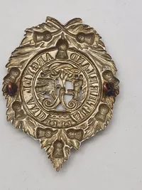 Originalt WW1/WW2  kasketmærke tilhørende Argyll and Sutherland Highlanders, et tidligere infanteriregiment i den britiske hær.