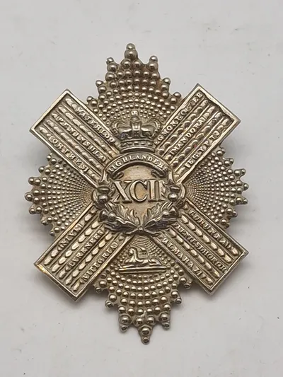 regimentsmærkeWW1/WW2  for The Gordon Highlanders, et tidligere infanteriregiment i den britiske hær.