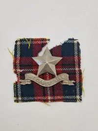 Originalt WW2 badge  fra The Cameronians (Scottish Rifles)