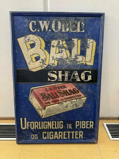 Originalt Antikt C.W. Obels Bali Shag metal skilt