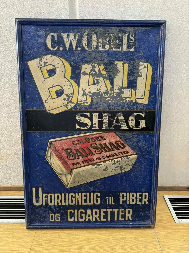 Originalt Antikt C.W. Obels Bali Shag metal skilt