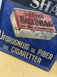 Originalt Antikt C.W. Obels Bali Shag metal skilt