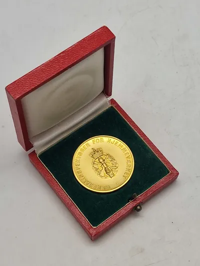 Original mønt for duelighedsskydning i HJV med æske