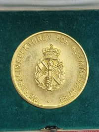 Original mønt for duelighedsskydning i HJV med æske