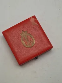 Original mønt for duelighedsskydning i HJV med æske