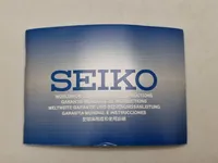 Originalt Seiko ur med æske og papirer