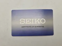 Originalt Seiko ur med æske og papirer