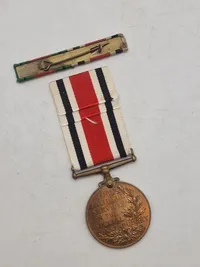Original “Special Constabulary Long Service Medal". med navn