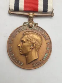 Original “Special Constabulary Long Service Medal". med navn