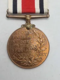 Original “Special Constabulary Long Service Medal". med navn