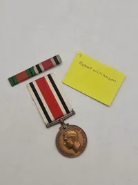 Original “Special Constabulary Long Service Medal". med navn