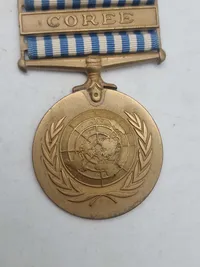 De Forenede Nationers Koreamedalje (United Nations Service Medal for Korea – UNSMK).