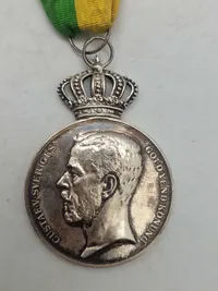 Original medalje fra Det Kongelige Patriotiska Sällskapet, tildelt Rudolf Ekberg for "Långvarig trogen tjenst" (langvarig trofast tjeneste).