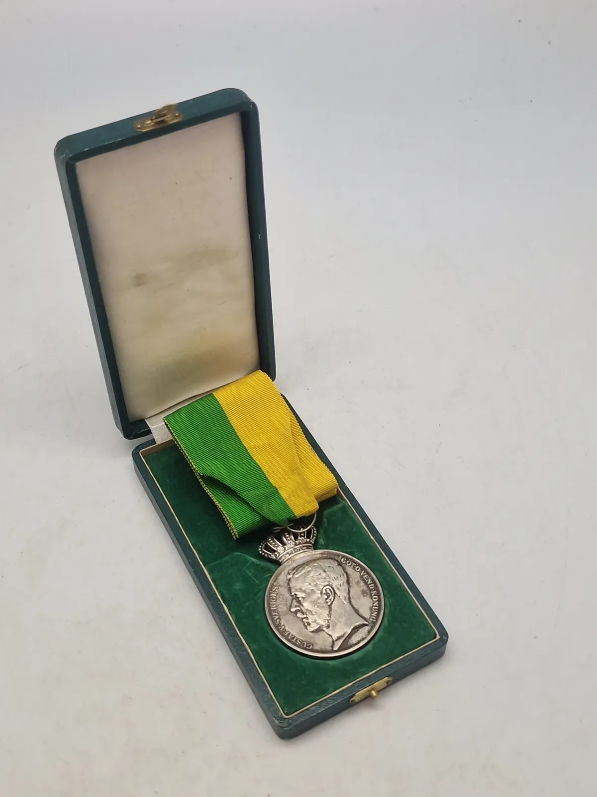 Original medalje fra Det Kongelige Patriotiska Sällskapet, tildelt Rudolf Ekberg for "Långvarig trogen tjenst" (langvarig trofast tjeneste).