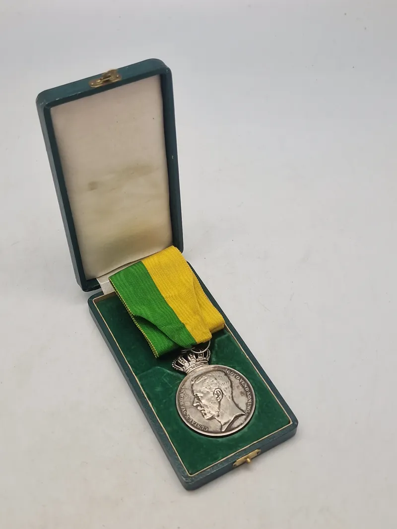 Original medalje fra Det Kongelige Patriotiska Sällskapet, tildelt Rudolf Ekberg for "Långvarig trogen tjenst" (langvarig trofast tjeneste).