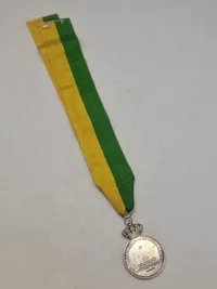 Original medalje fra Det Kongelige Patriotiska Sällskapet, tildelt Rudolf Ekberg for "Långvarig trogen tjenst" (langvarig trofast tjeneste).