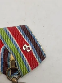 Original FN-medalje, som er en international dekoration tildelt af De Forenede Nationer (FN) til militært og politimæssigt personale, der har deltaget i FN-operationer.