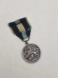 Original finsk mindemedalje for Frihedskrigen (Vapaussodan muistomitali), som blev indstiftet den 10. september 1918 af det finske senat.