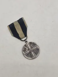 Original finsk mindemedalje for Frihedskrigen (Vapaussodan muistomitali), som blev indstiftet den 10. september 1918 af det finske senat.