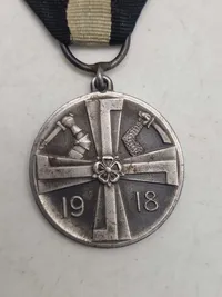 Original finsk mindemedalje for Frihedskrigen (Vapaussodan muistomitali), som blev indstiftet den 10. september 1918 af det finske senat.