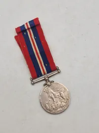 Original britisk kampagnemedalje, der blev tildelt borgere i det britiske Commonwealth for deres tjeneste under Anden Verdenskrig - navngiven
