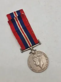 Original britisk kampagnemedalje, der blev tildelt borgere i det britiske Commonwealth for deres tjeneste under Anden Verdenskrig - navngiven