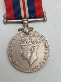 Original britisk kampagnemedalje, der blev tildelt borgere i det britiske Commonwealth for deres tjeneste under Anden Verdenskrig - navngiven