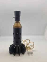 Lampe lavet af halen fra mortergranat