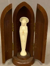 Religiøs figur i lommestørrelse