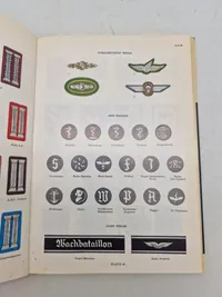 Samling gode opslagsværker omkring medaljer og bars